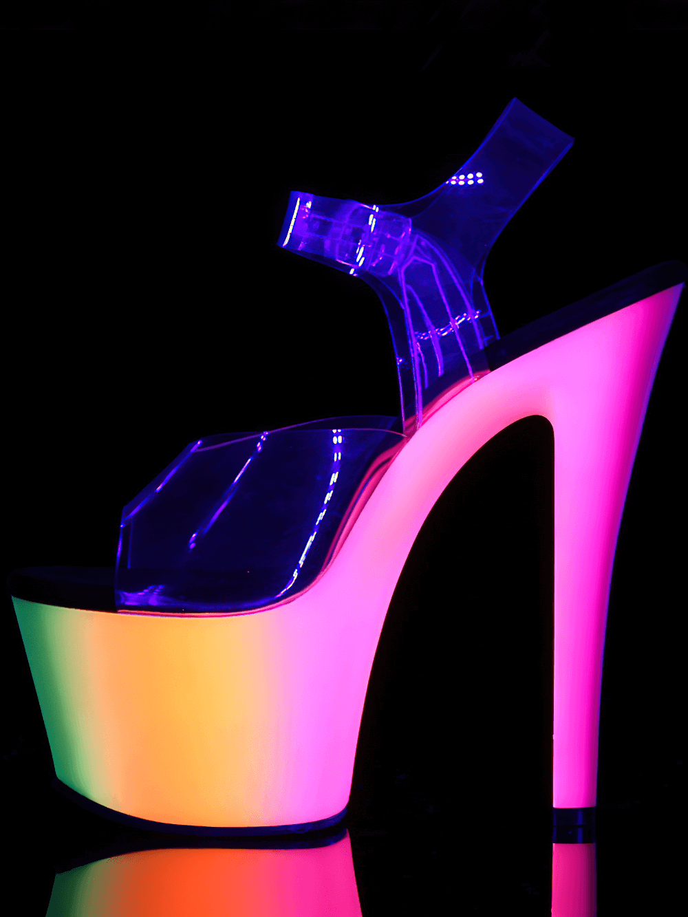 Neon glow platform sandals with clear straps and 7-inch heel, shining under UV light for vibrant nightlife.