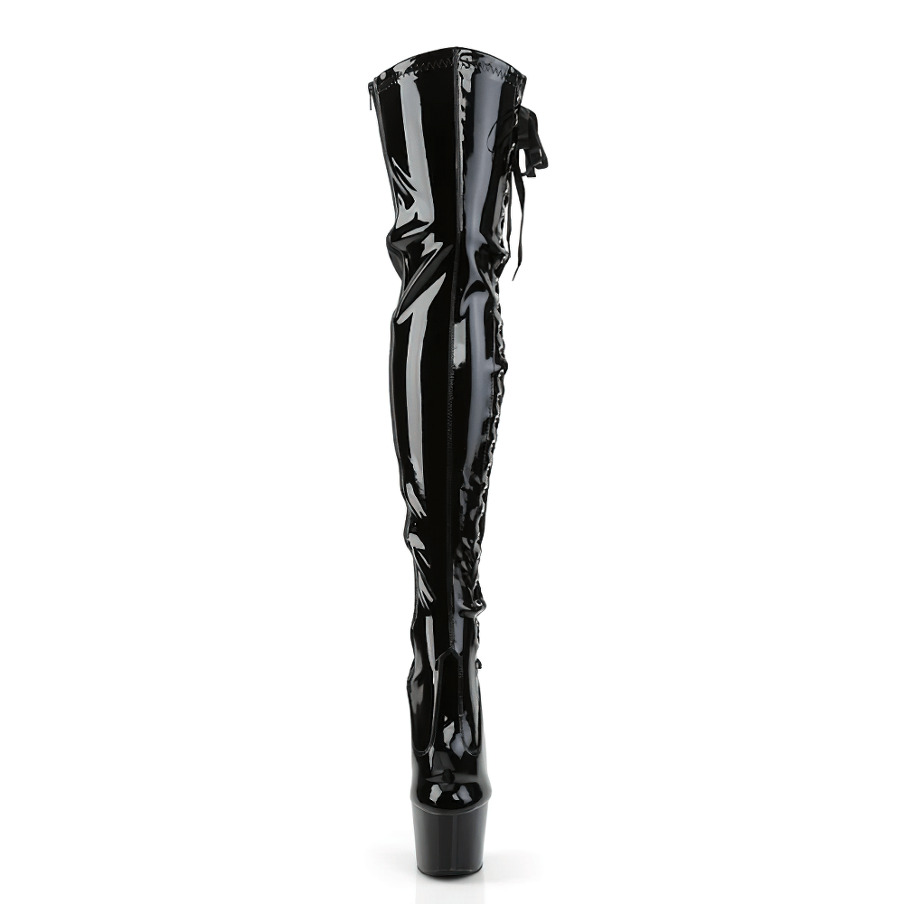 Stylish black thigh-high platform lace-up boots with shiny finish and playful side ribbon detailing.