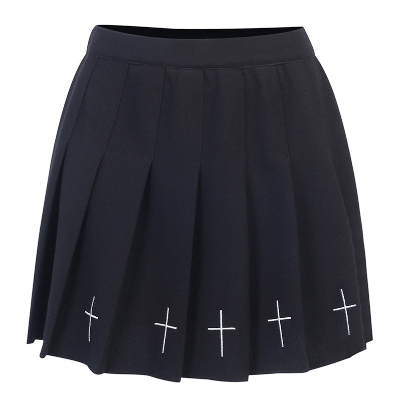 Black pleated mini skirt with white cross detailing, perfect for gothic or rock chic outfits, ideal for Halloween parties.