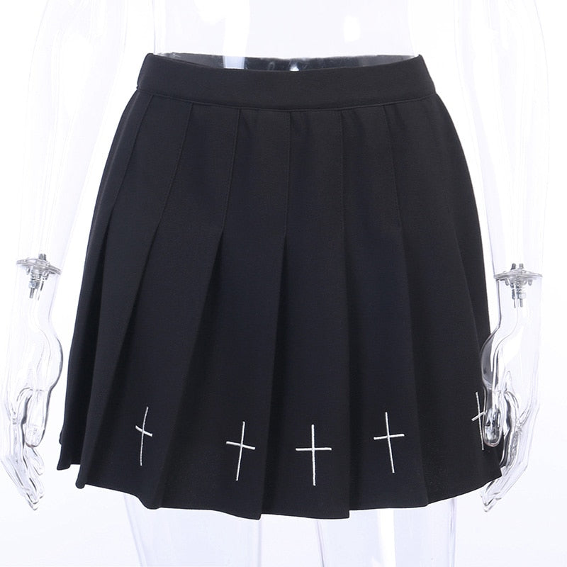 Pleated gothic mini skirt with white crosses, perfect for edgy Halloween outfits and rock chick fashion.