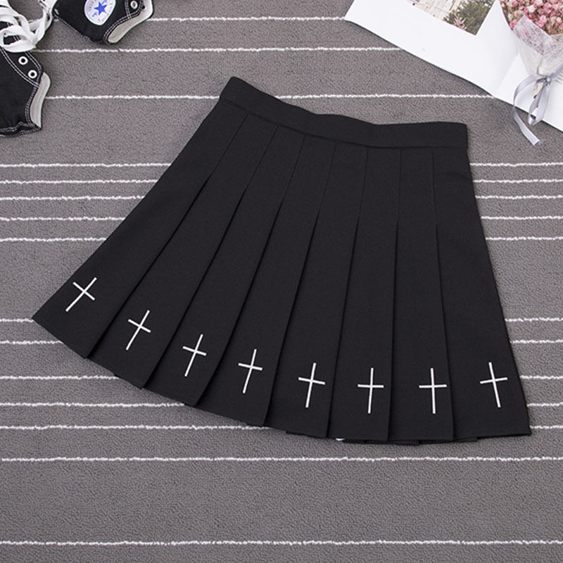 Pleated black mini skirt with white crosses, perfect for gothic style outfits and Halloween parties.
