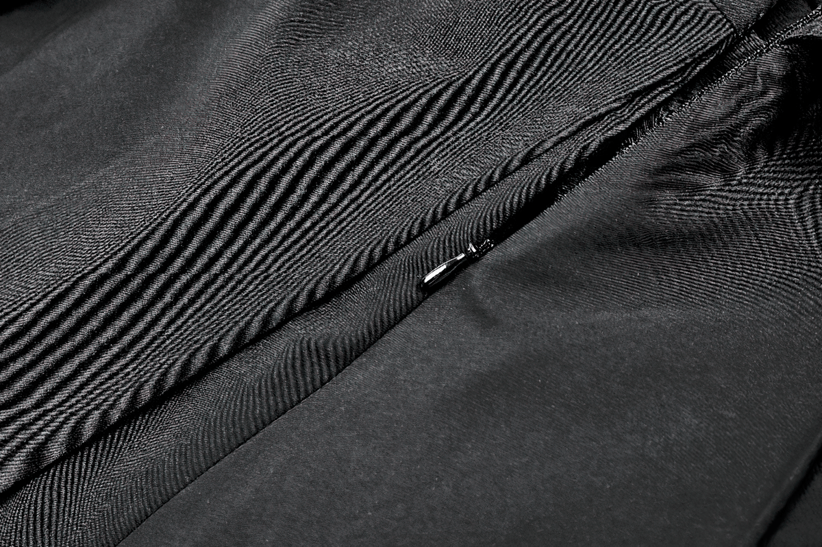 Pleated Mini Dress with Corset Lace-Up Back Detail in black, featuring a textured close-up of the corset back and fabric