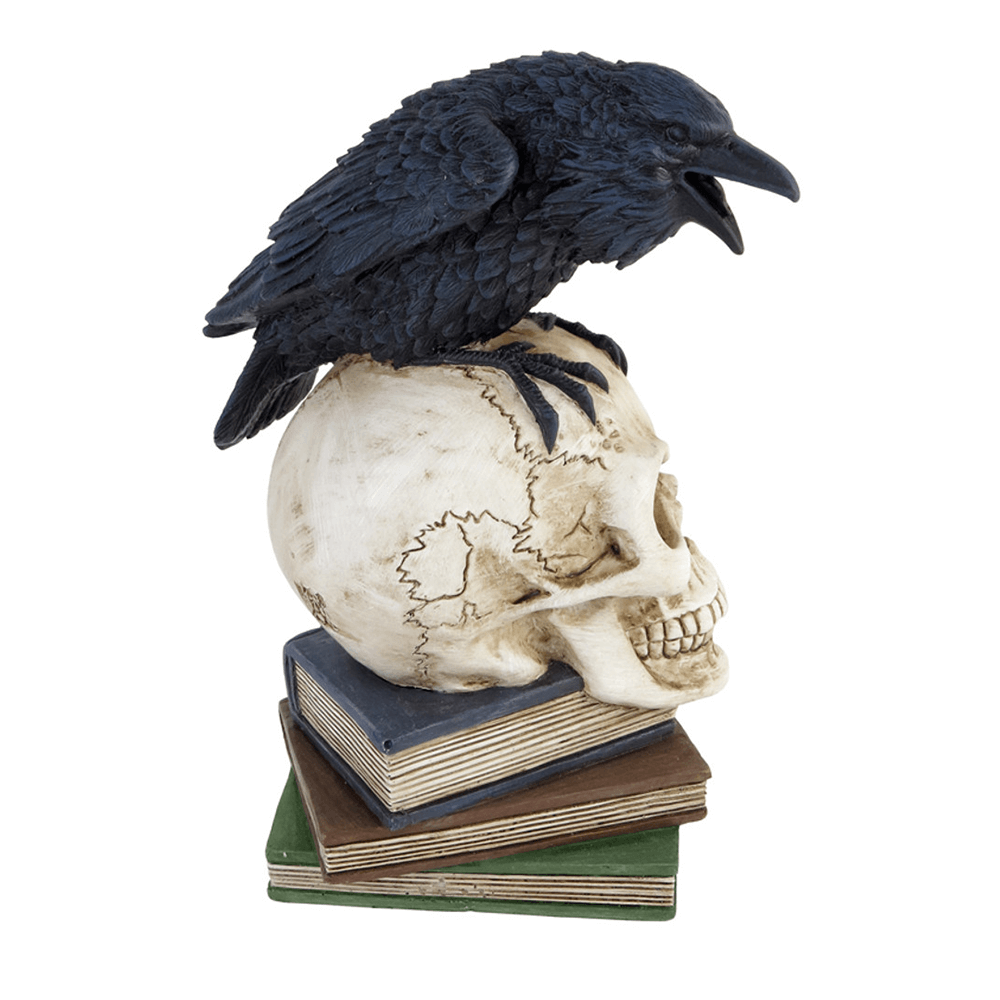 Edgar Allan Poe-inspired raven on skull figurine atop books, ideal for gothic decor and dark literature lovers.