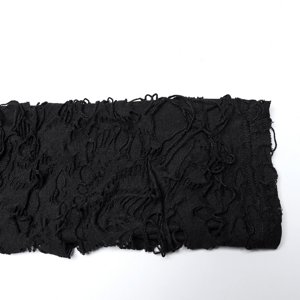 Distressed black knit fabric showcasing an edgy, post-apocalyptic texture, perfect for gothic fashion enthusiasts.