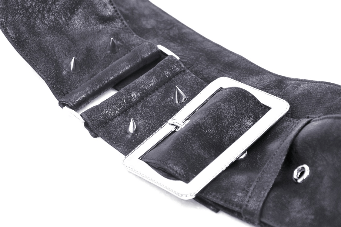 Close-up of post-apocalyptic faux leather pocket belt with lace-up closure and metal spikes for an edgy punk rock vibe.