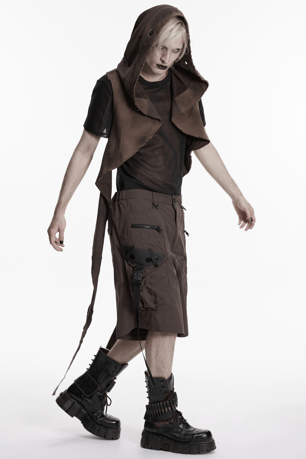 Post Apocalyptic Hooded Sleeveless Cape Vest For Men showcased by a male model with punk style in a modern, wasteland-inspired outfit.