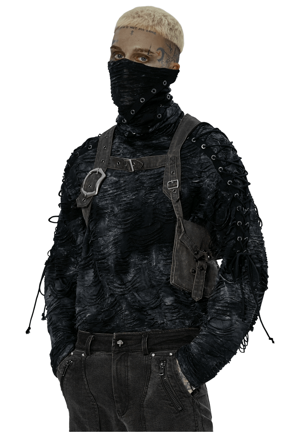 Man in a post-apocalyptic outfit featuring a textured black top, harness, and face covering for a punk aesthetic.