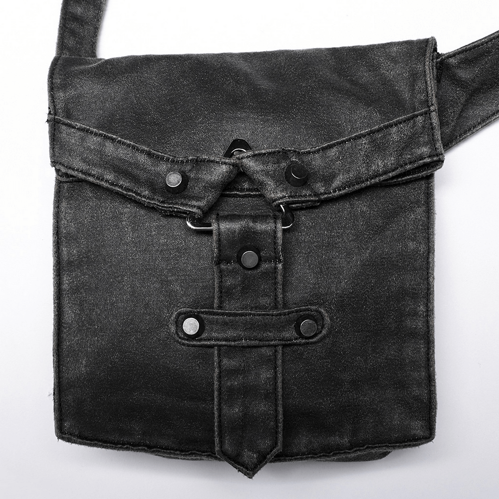 Post-apocalyptic leather crossbody bag featuring a washed black faux leather finish and adjustable buckle for edgy style.
