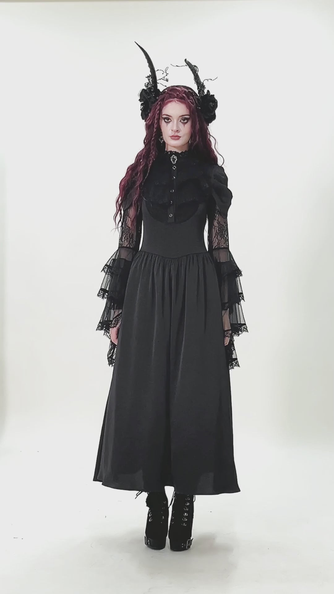 Gothic Lace Bell-Sleeve Black Dress with Corset Back showcased on model with dramatic makeup and accessories.
