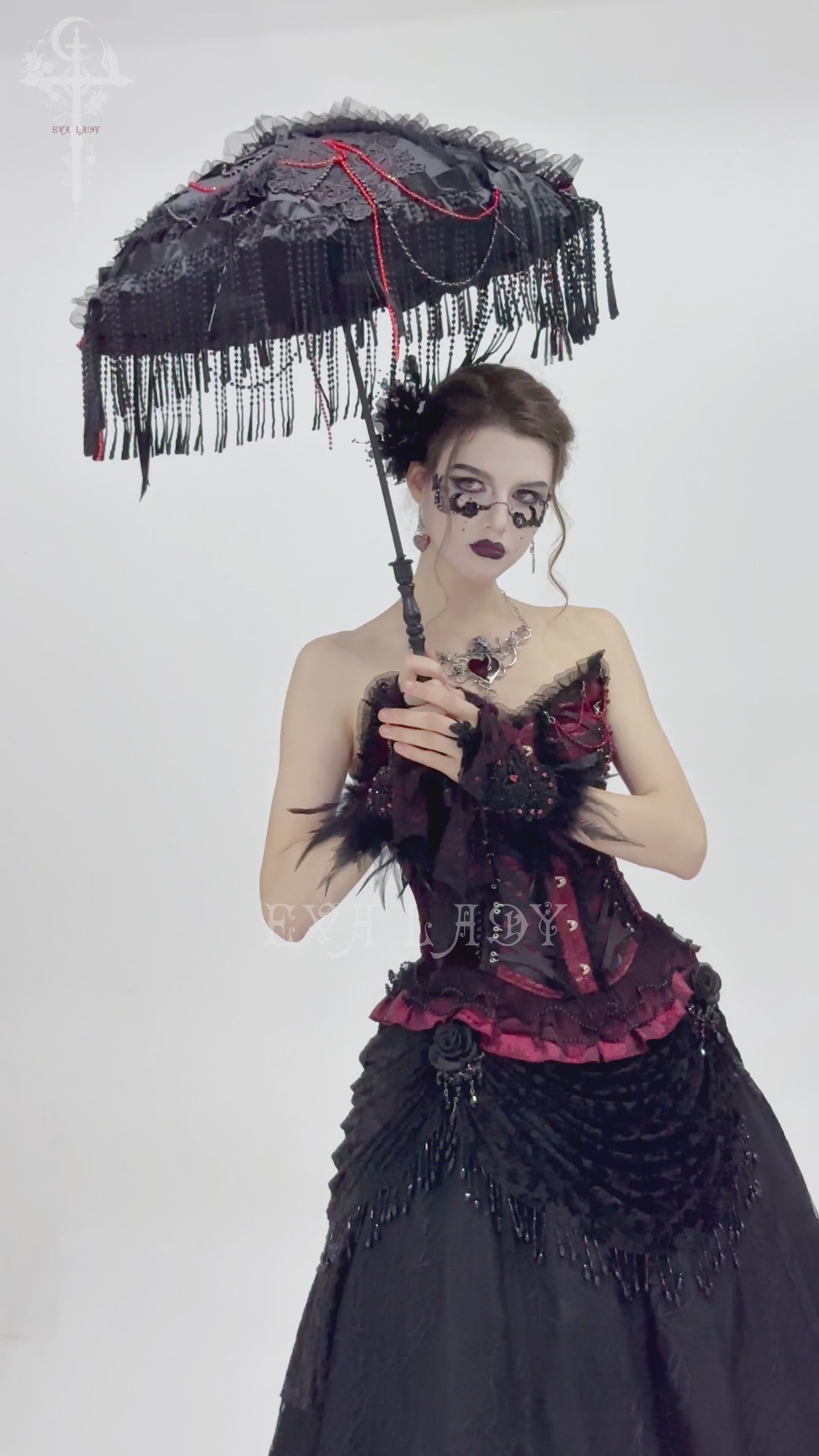 Gothic black lace and bead fringe umbrella with red details, perfect for dark vintage fashion.