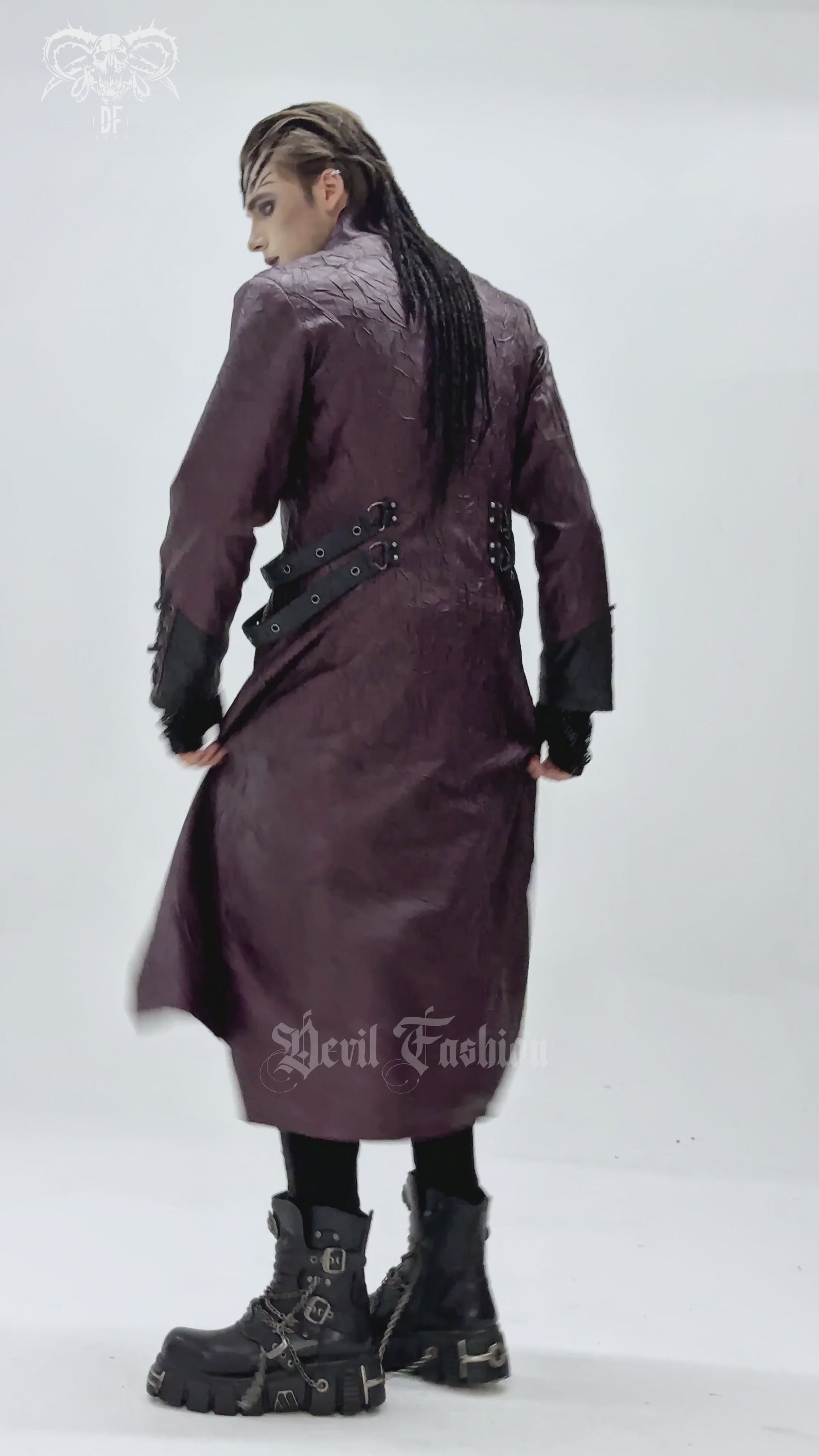Stylish Longline Punk and Steampunk Buckle Coat worn by a model with a dramatic pose.