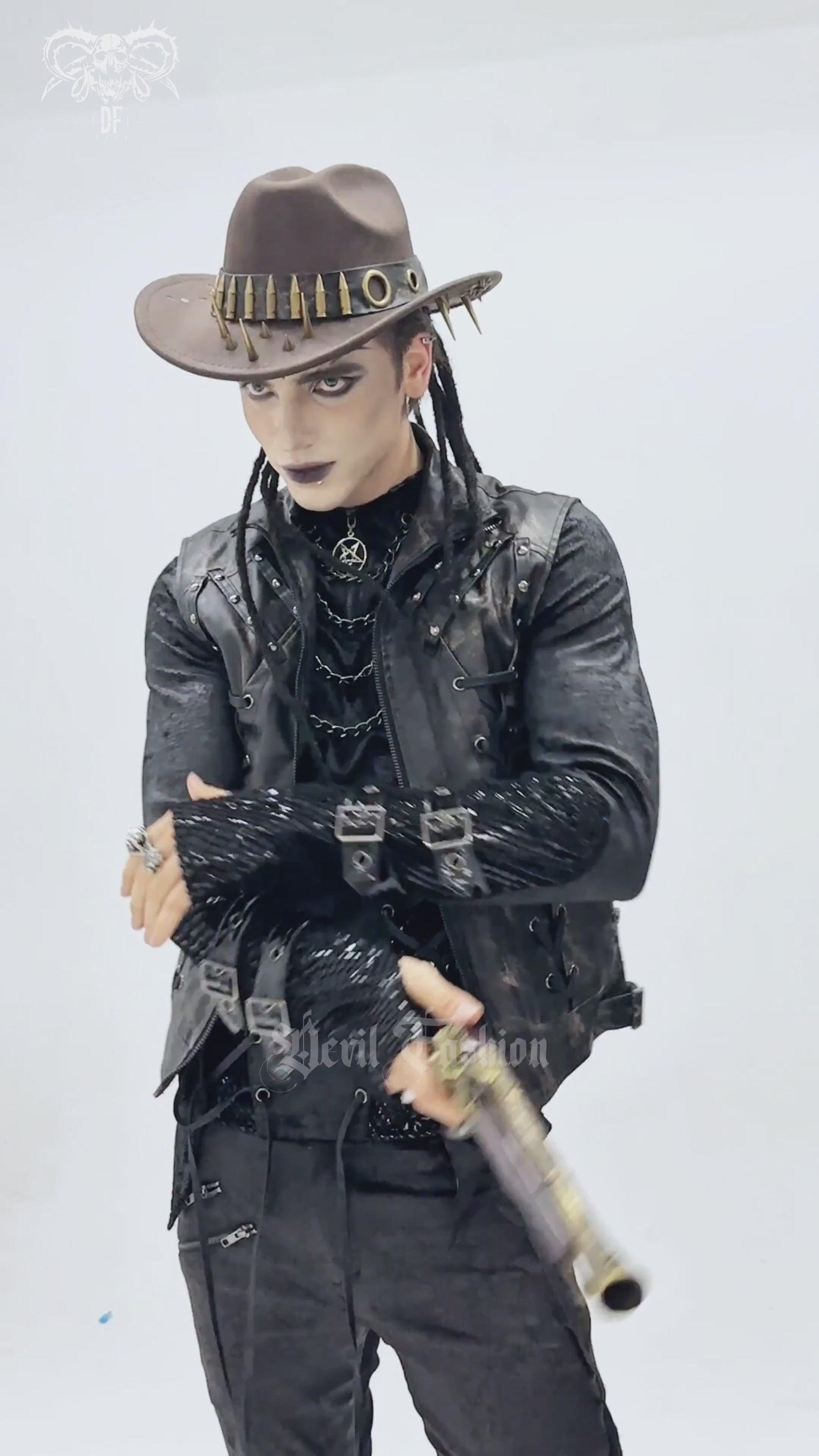 Brown Gothic Cowboy Hat with Resin Bullets and Studs worn by a model in a dark, edgy outfit with accessories.