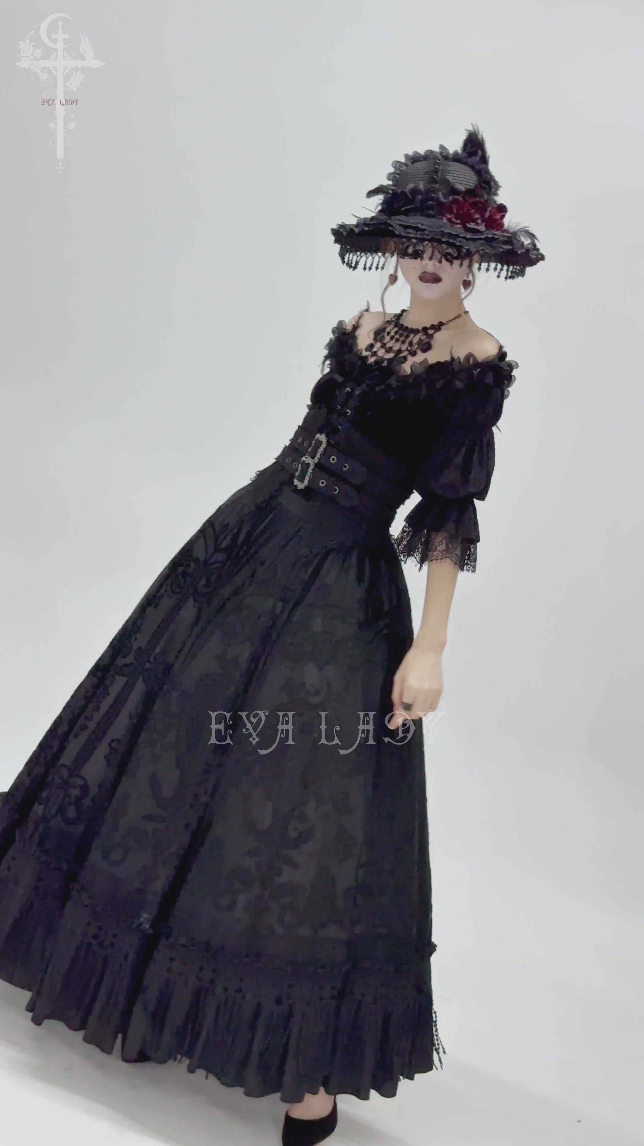 Gothic black maxi skirt with lace overlay and corset waist, styled for a Victorian-inspired look.