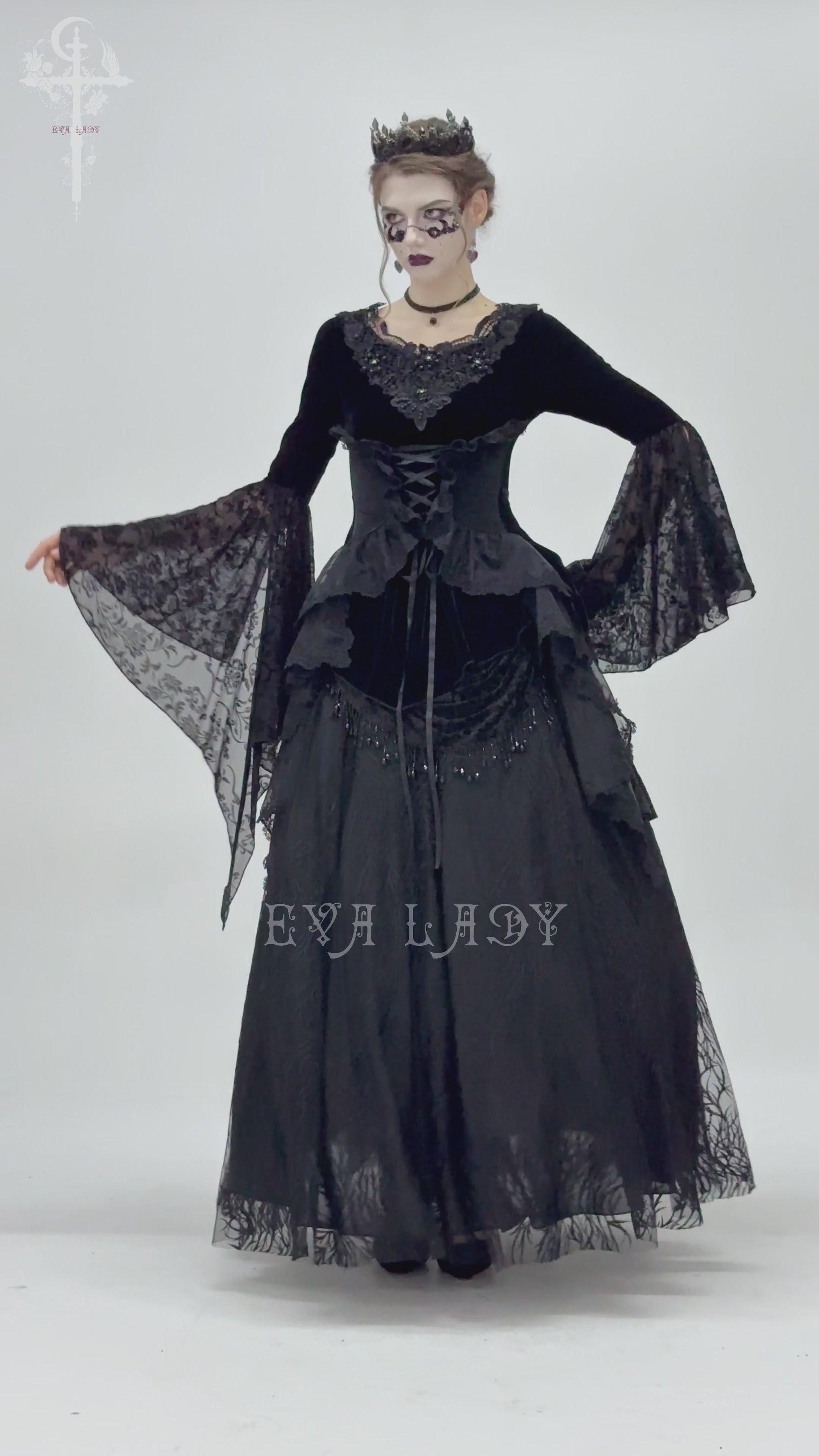 Gothic black velvet top with corset front, lace sleeves, and Victorian lace trim, perfect for cosplay and evening wear.