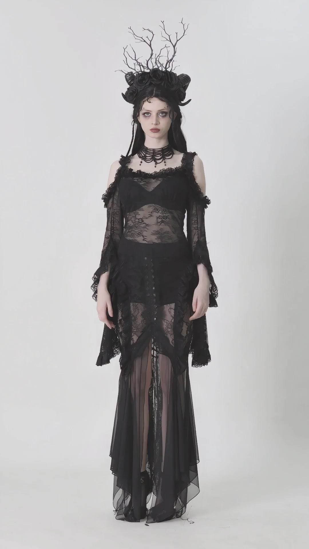 Gothic sheer black lace top with flowing sleeves, perfect for dark romantic aesthetics.