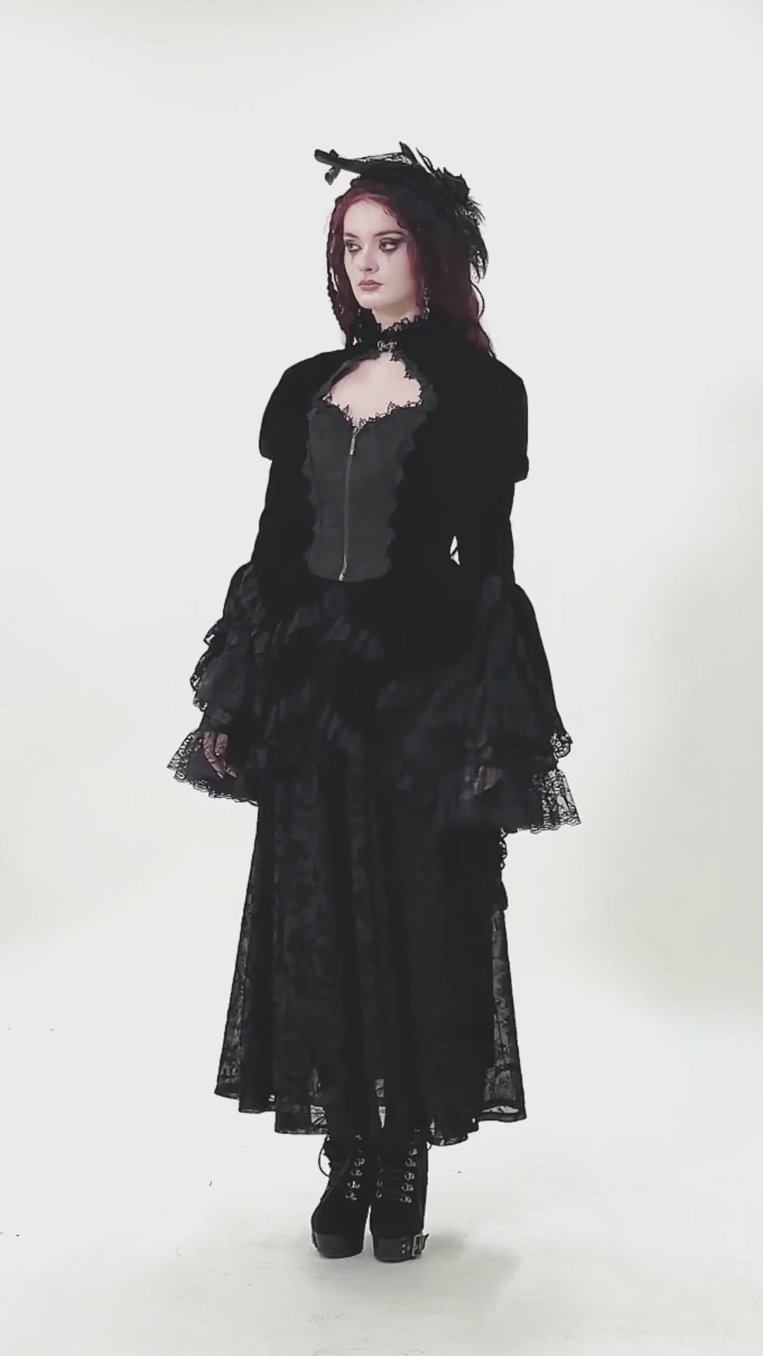 Goth Lace-Up Tiered High-Low Jacket with Bell Sleeves worn by a model, showcasing gothic elegance and tiered hem details.
