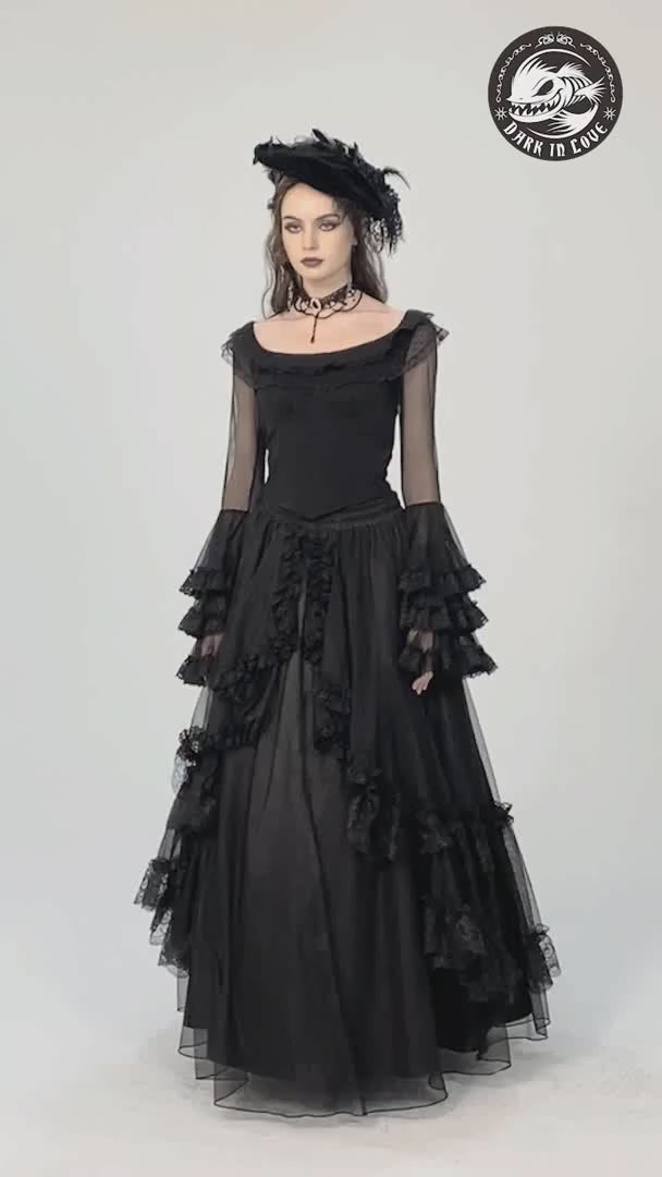 Elegant gothic black dress with sheer sleeves and ruffled details, perfect for alternative fashion lovers.