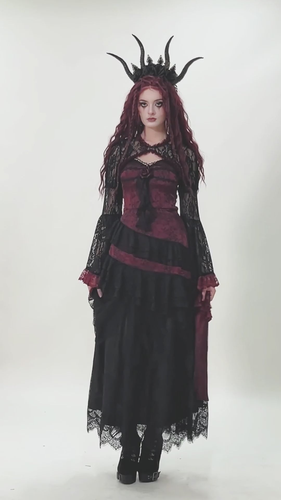 Gothic Black Lace Shrug with Red Ruffled Trim Sleeves worn over a dramatic black and red gown with flared cuffs.