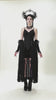 Gothic Black Lace Maxi Dress with Split Panels showcased on a model, featuring corset details and flowing lace overlay.