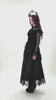 Chic Lace Sheer Top with Ruffled Off Shoulder Design worn with a long black lace dress and a decorative crown.