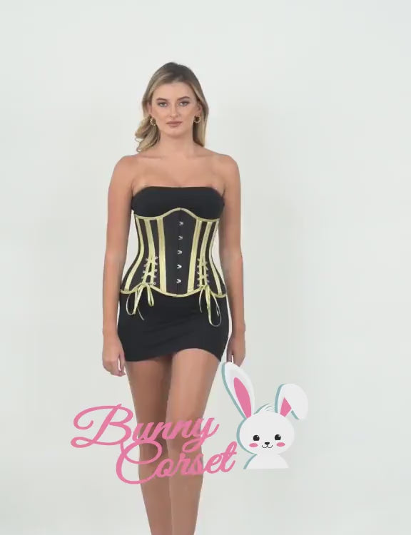 Model showcasing a stunning underbust waist training corset with lace-up back in stylish black and yellow.