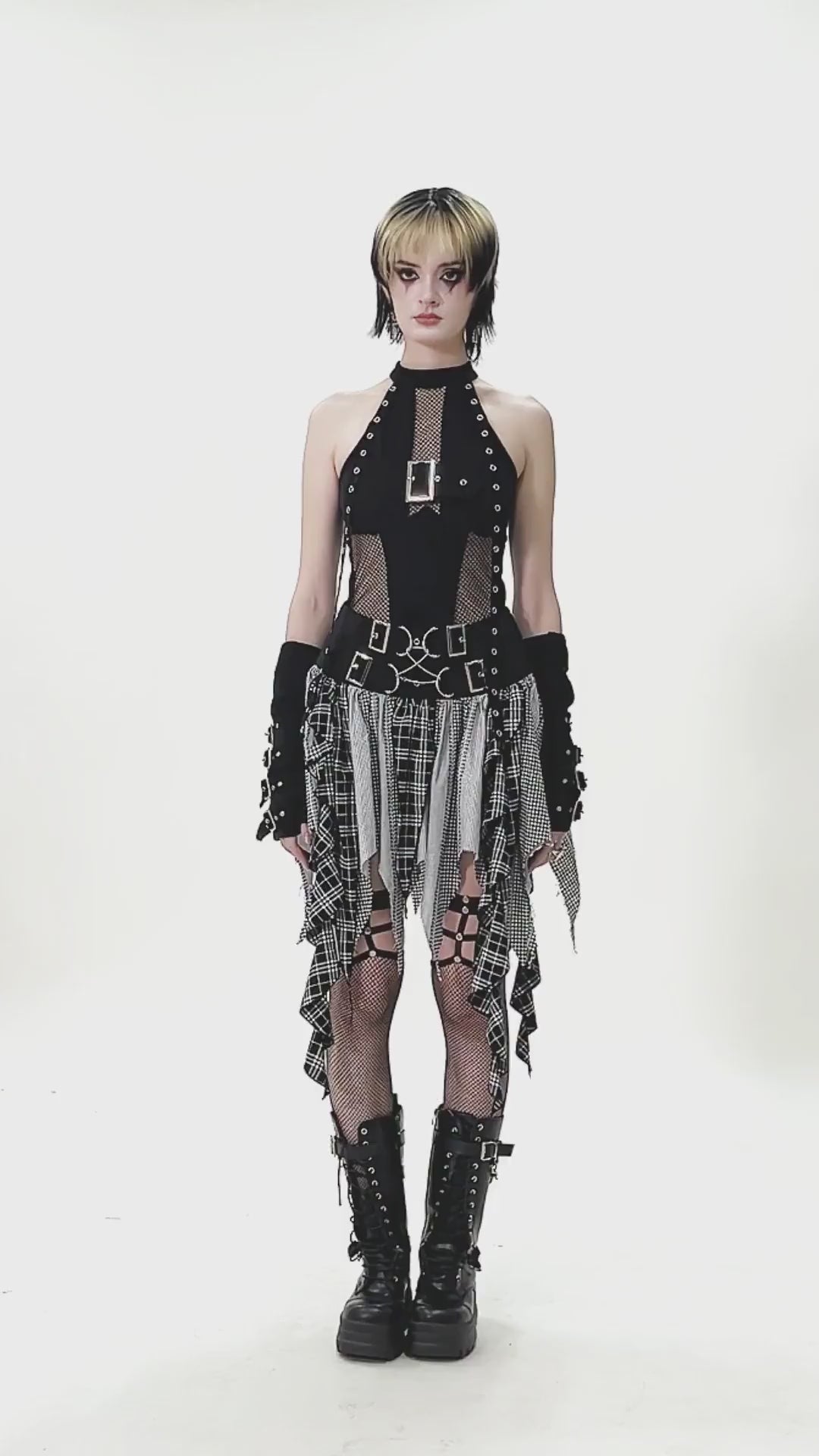 Plaid Skirt with Ruffled Design and Adjustable Belts showcased in a striking gothic outfit.