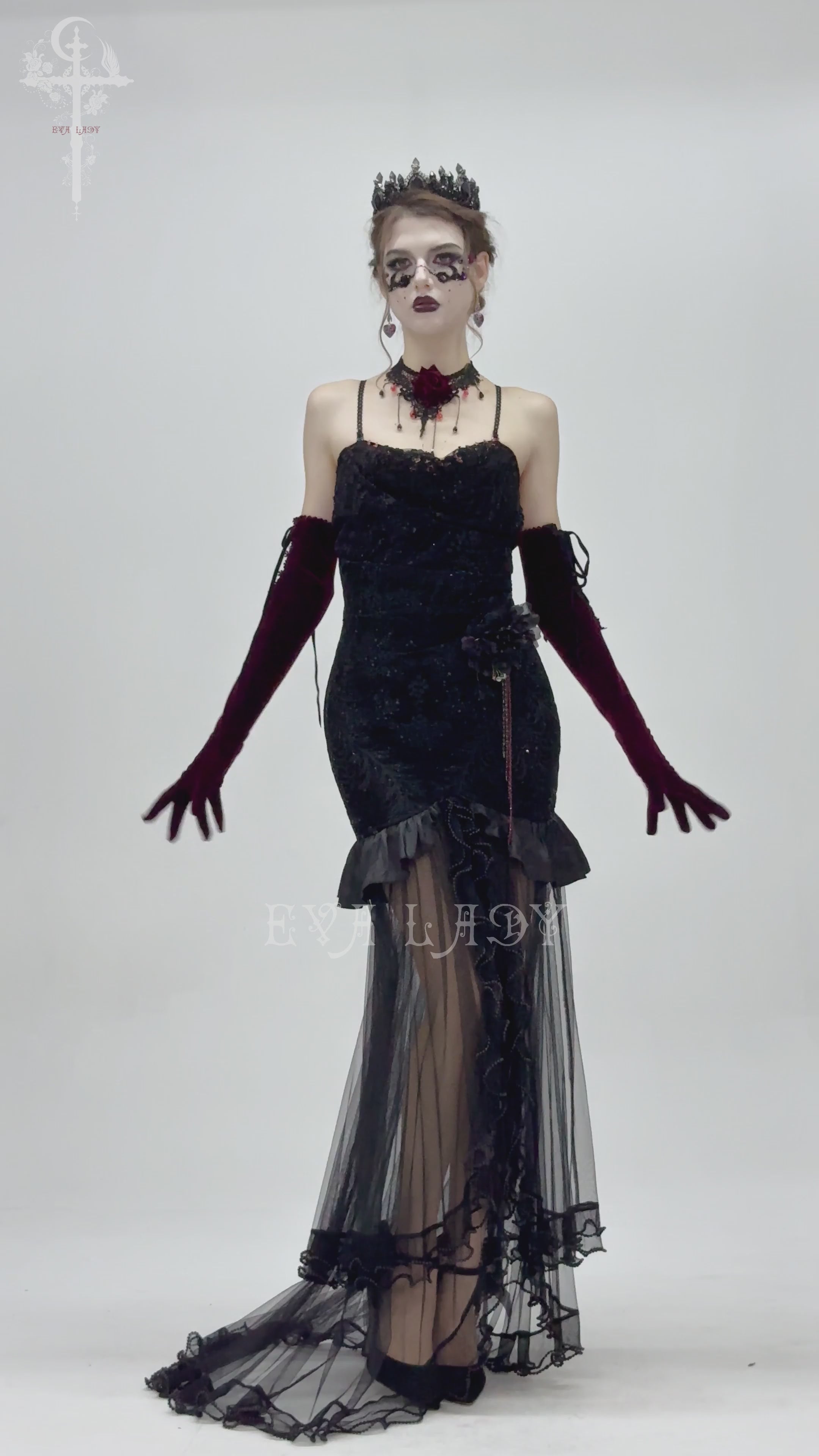 Gothic black velvet and sheer mesh high-low dress with beaded details, perfect for dark romance and masquerade events.