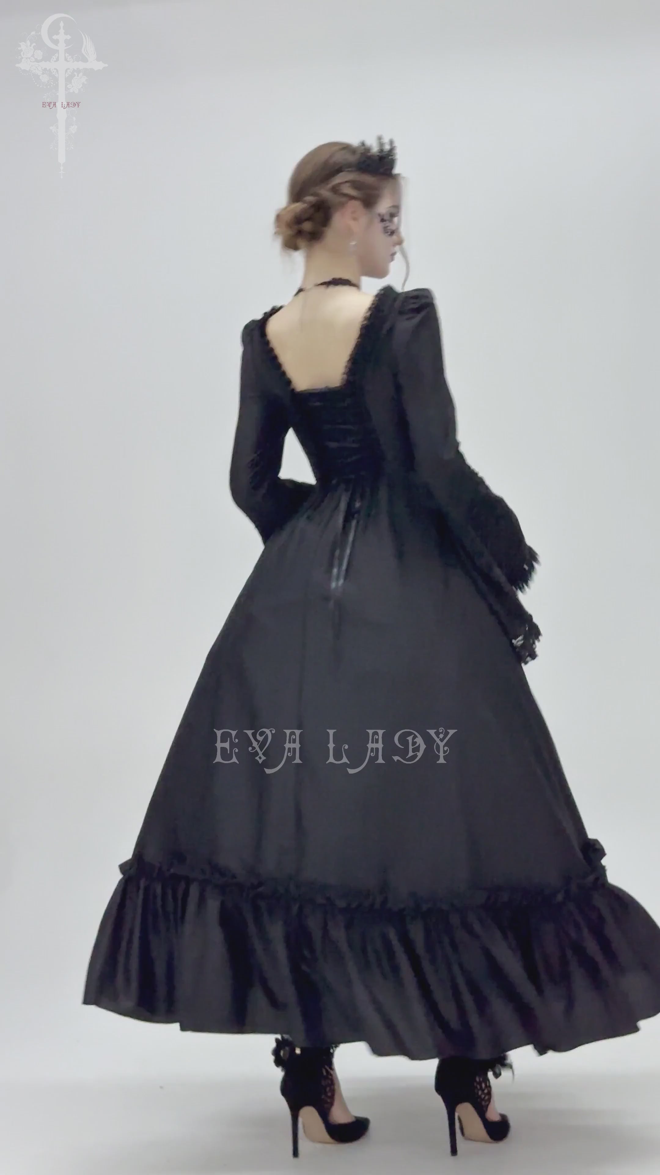 Elegant black lace medieval dress with long bell sleeves, corset back, and ruffled skirt, perfect for gothic events.