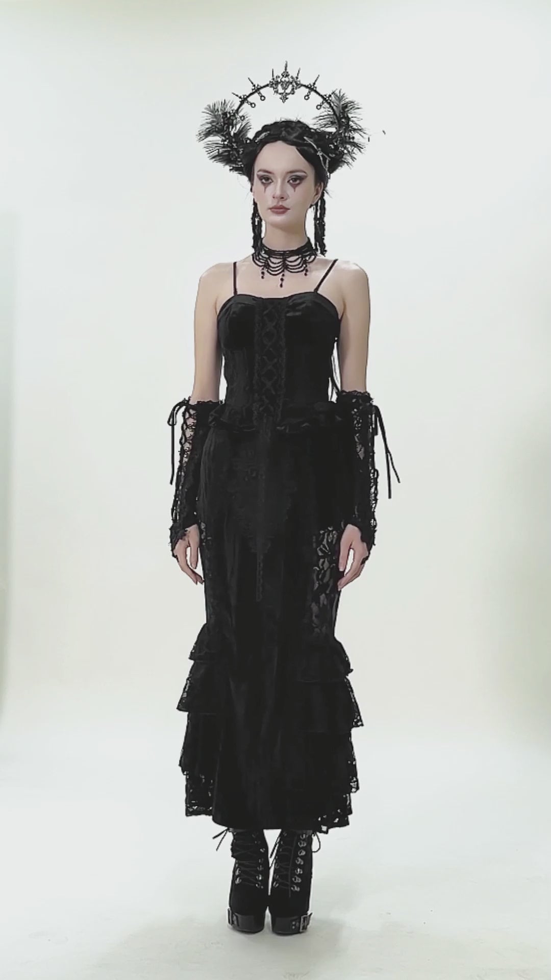 Velvet Lace Ruffled Bustier with Lace Trim and Lace-Up Back showcased by a model in gothic attire.