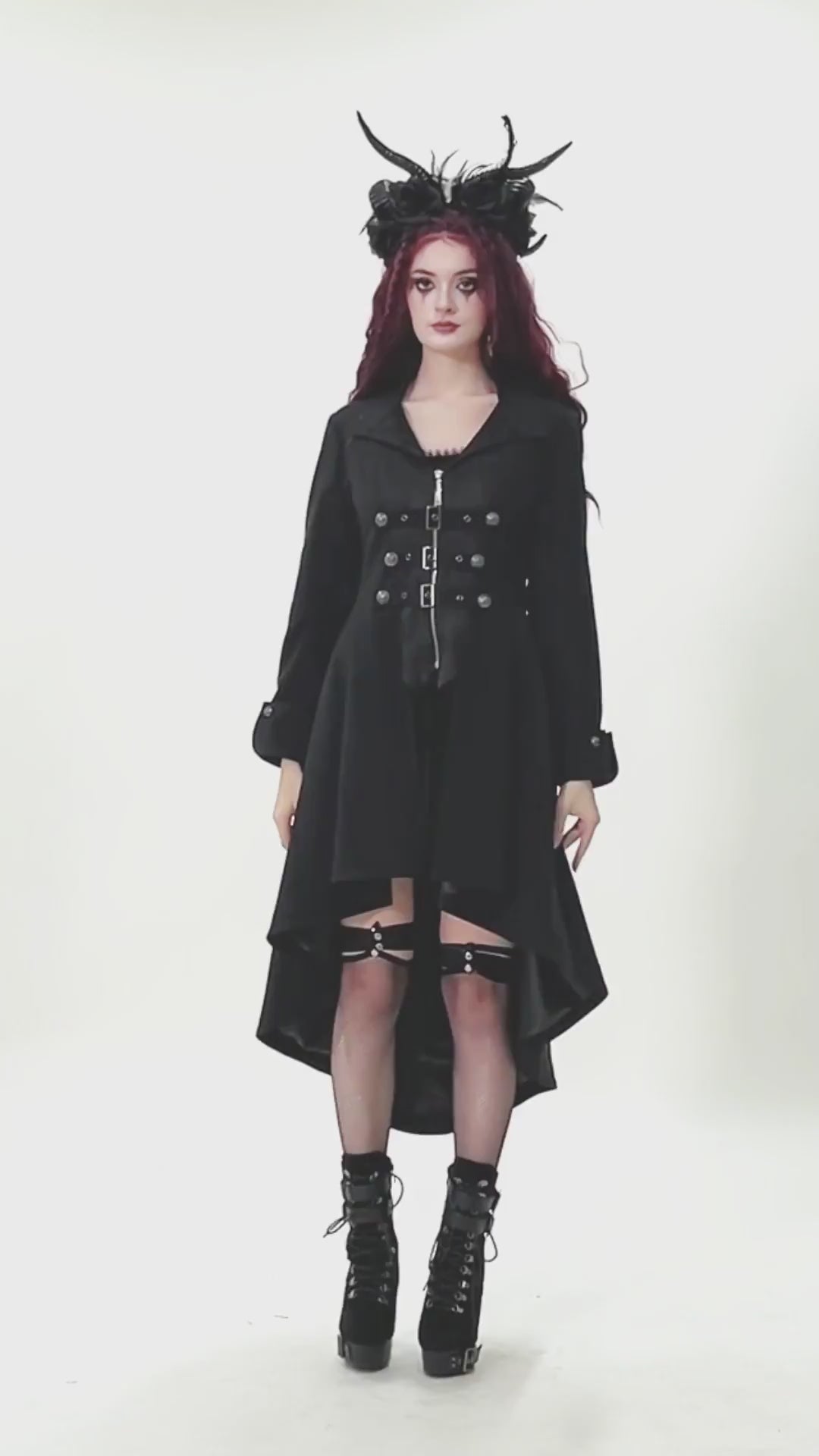 Women's Gothic High-Low Coat with Buckles and Lace-Up displayed by a model with striking accessories.