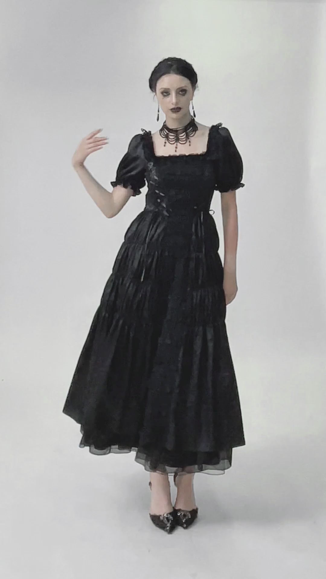 Victorian Gothic Black Puff-Sleeved Long Dress with lace-up corset and dramatic tiered ruffles.