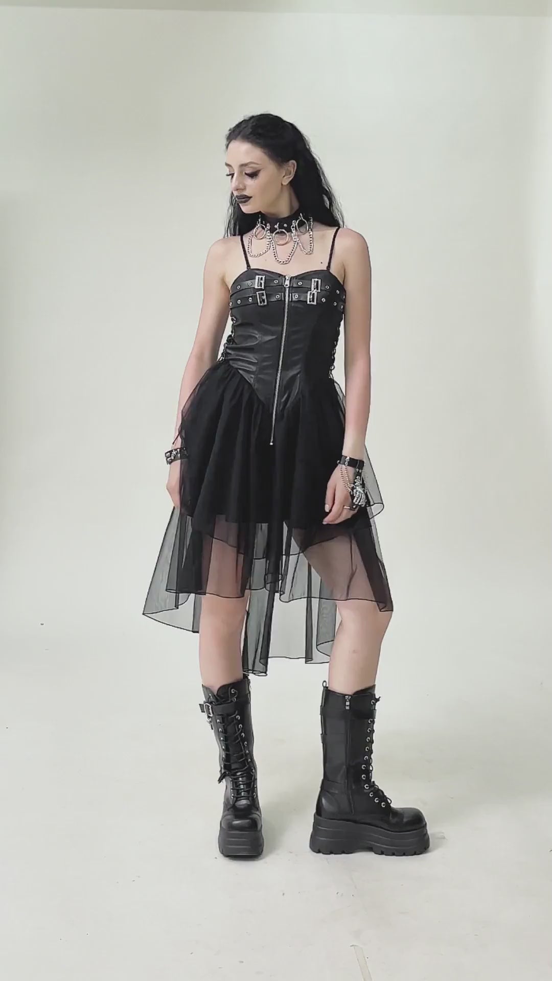 Dark Goth Dress with Mesh Layers and Adjustable Straps modeled with layered mesh and faux leather.