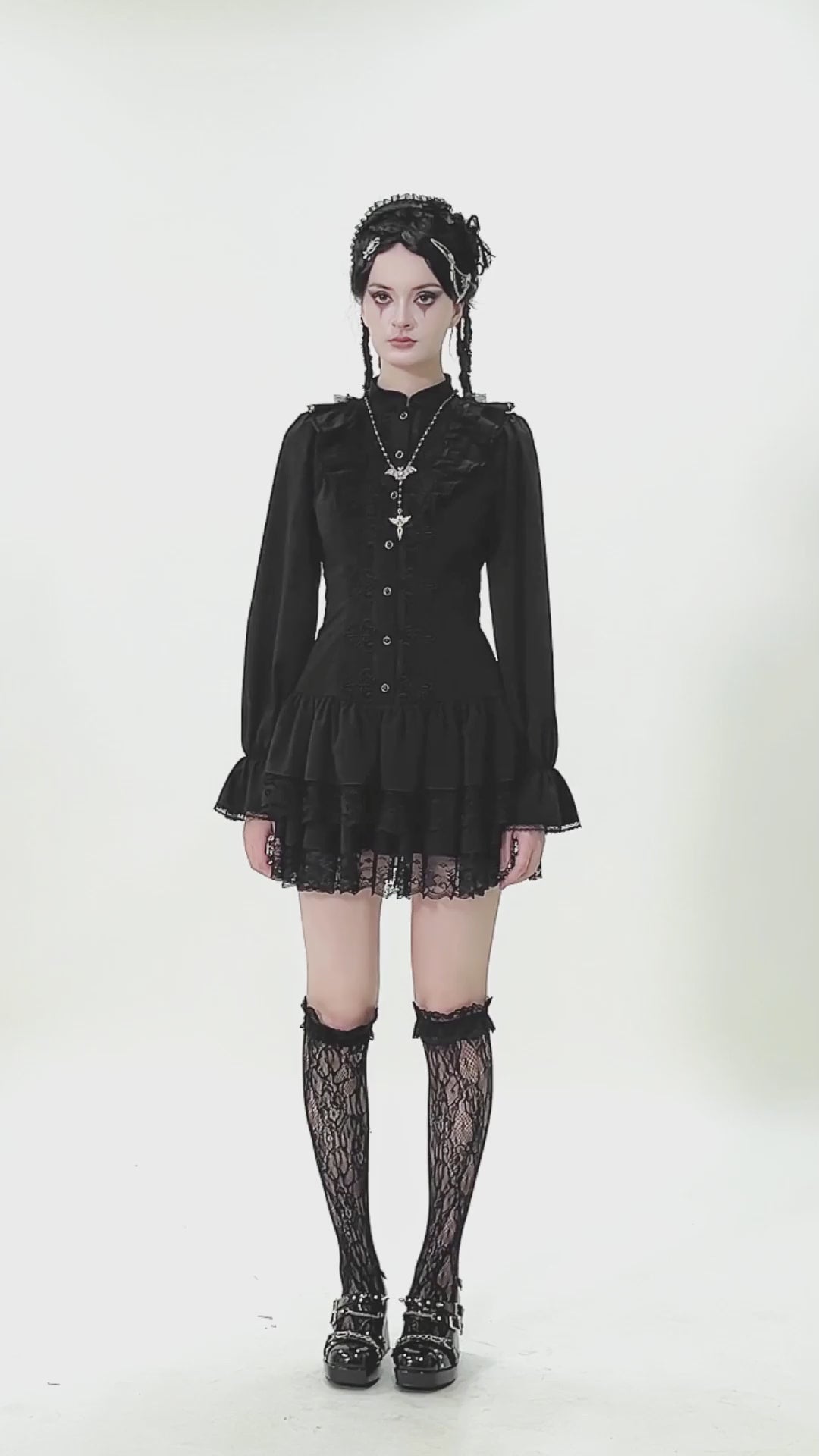 Women's Lace Mini Dress with Long Sleeves and Ruffles showcased on a model, featuring lace trim and a corset back.