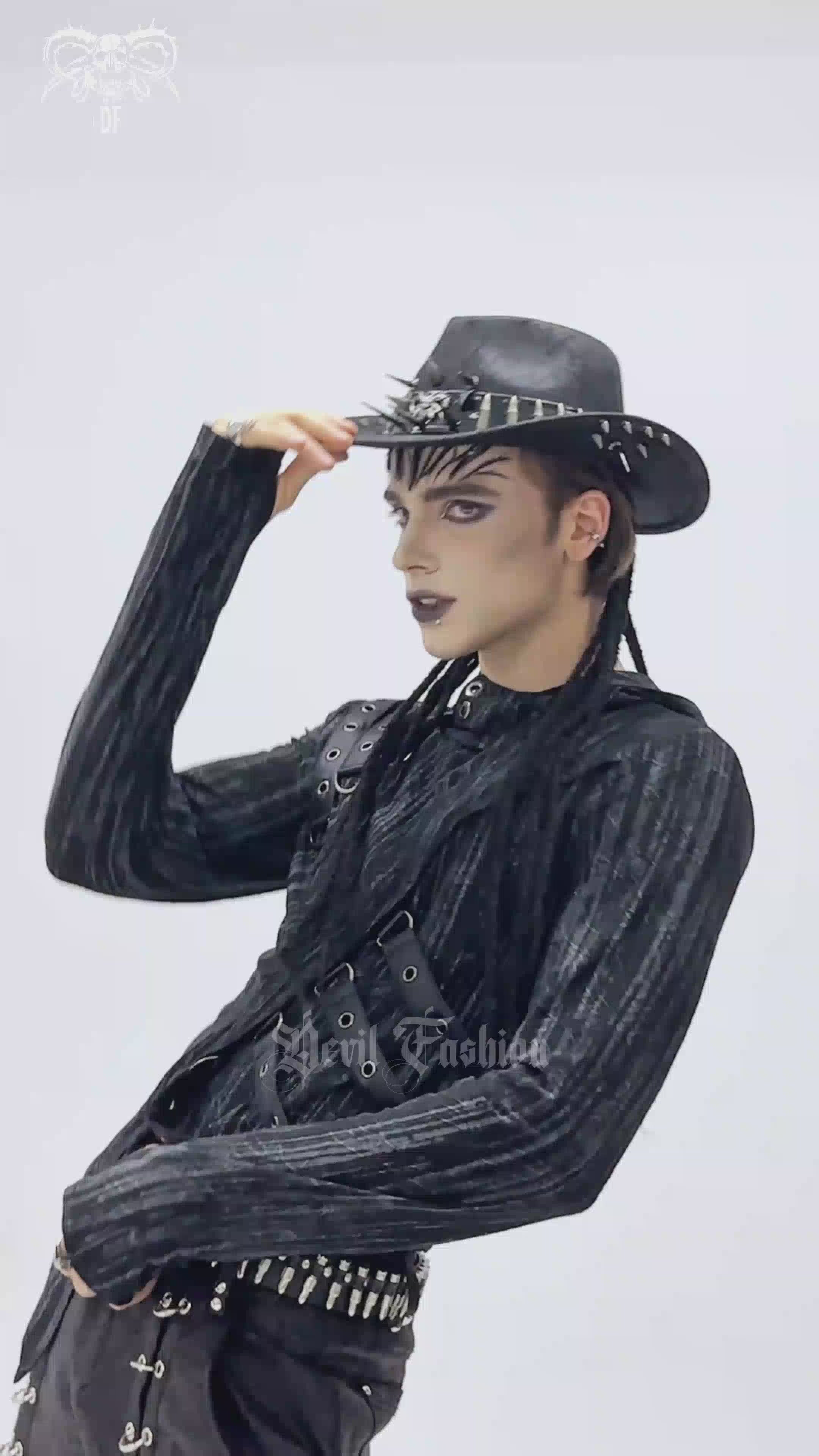Edgy Spiked Bullet Trim Gothic Western Cowboy Hat worn by a model in a dark outfit with punk styling.
