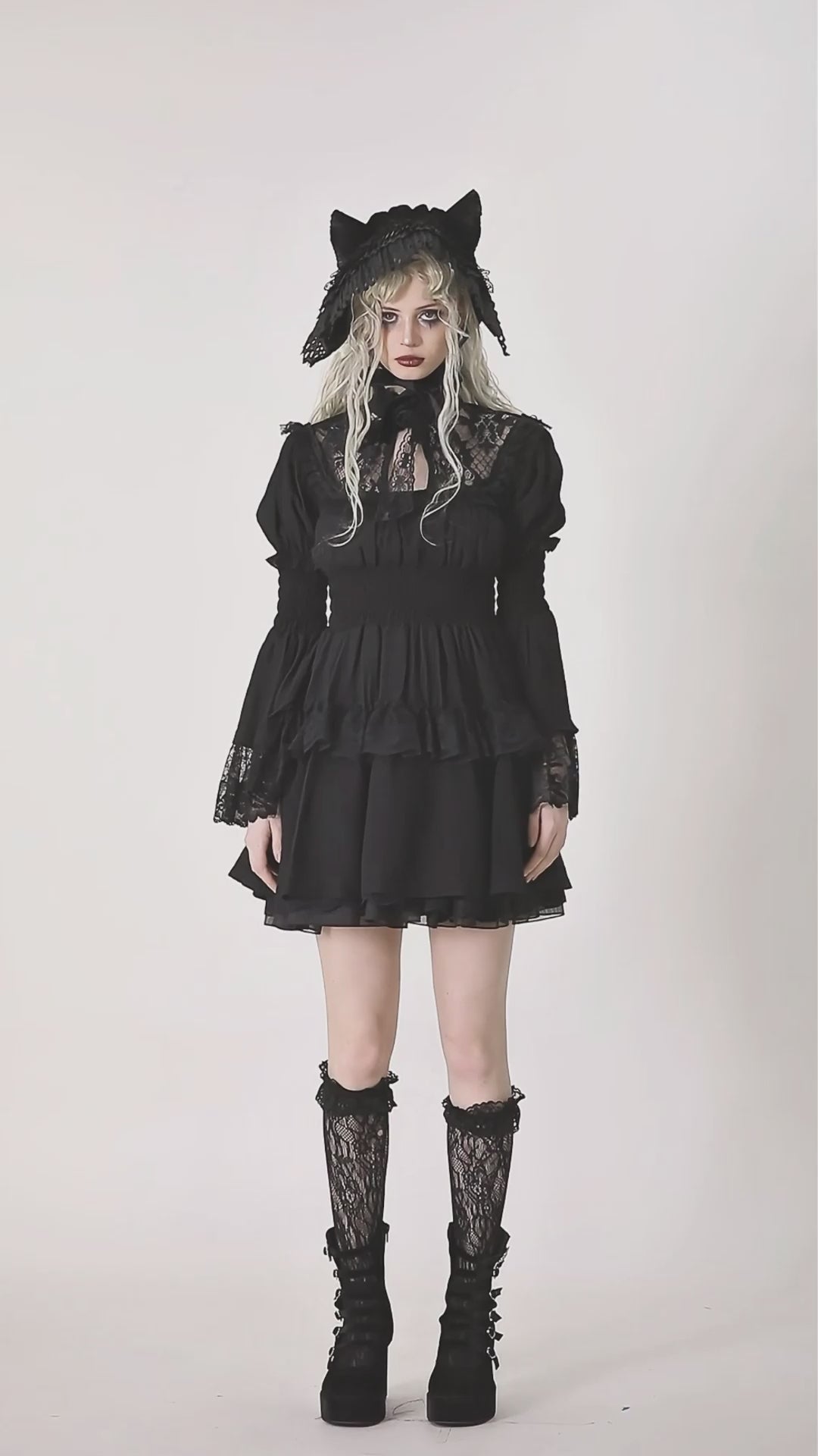 Victorian Gothic black lace dress with ruffles and bell sleeves, perfect for gothic fashion lovers.