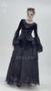 Gothic model in elegant black velvet lace skirt with beaded drapes, showcasing Victorian-inspired style and dark romance.