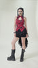 Chic Layered Ruffle Tailcoat Lantern Shorts for Women styled with a plaid top and combat boots for a gothic look.