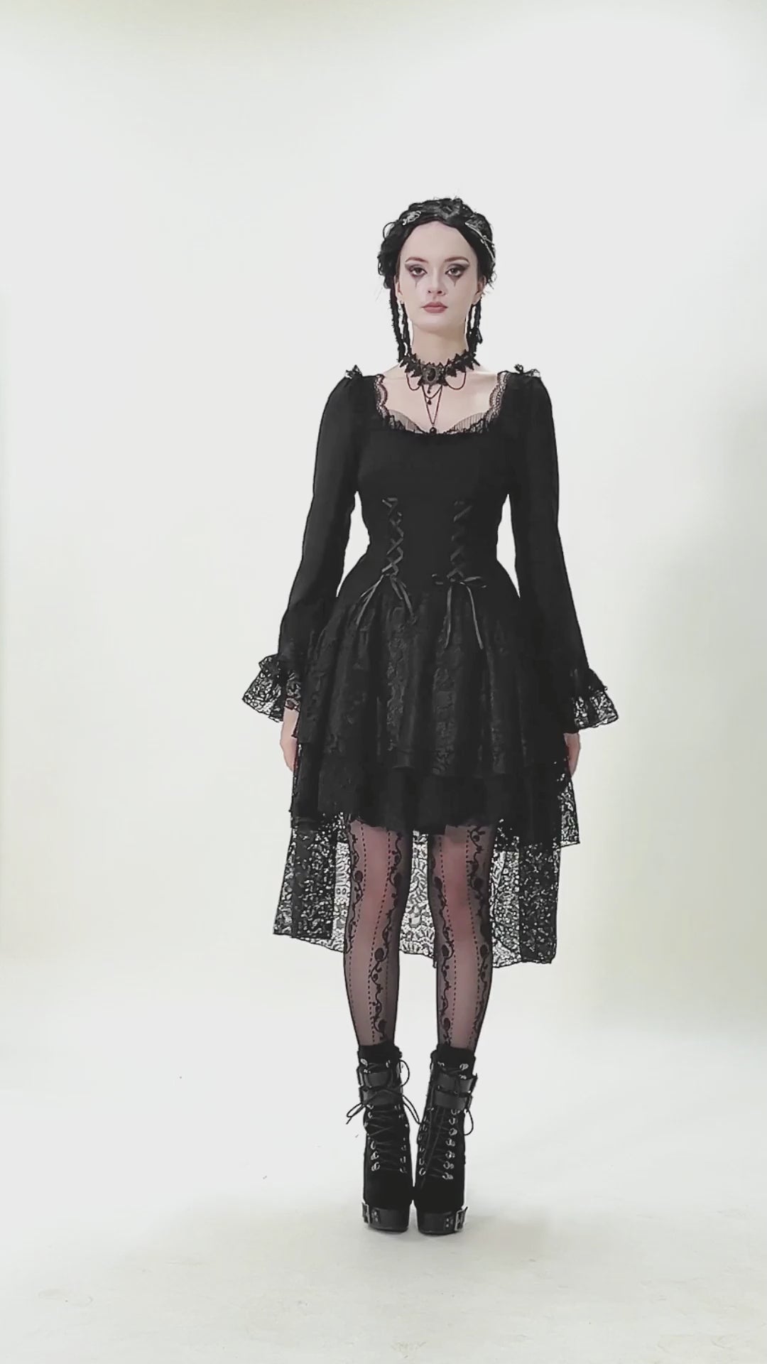Gothic Black Lace Medieval Dress with Corset Detail featured on model showcasing vintage elegance and flared lace cuffs.