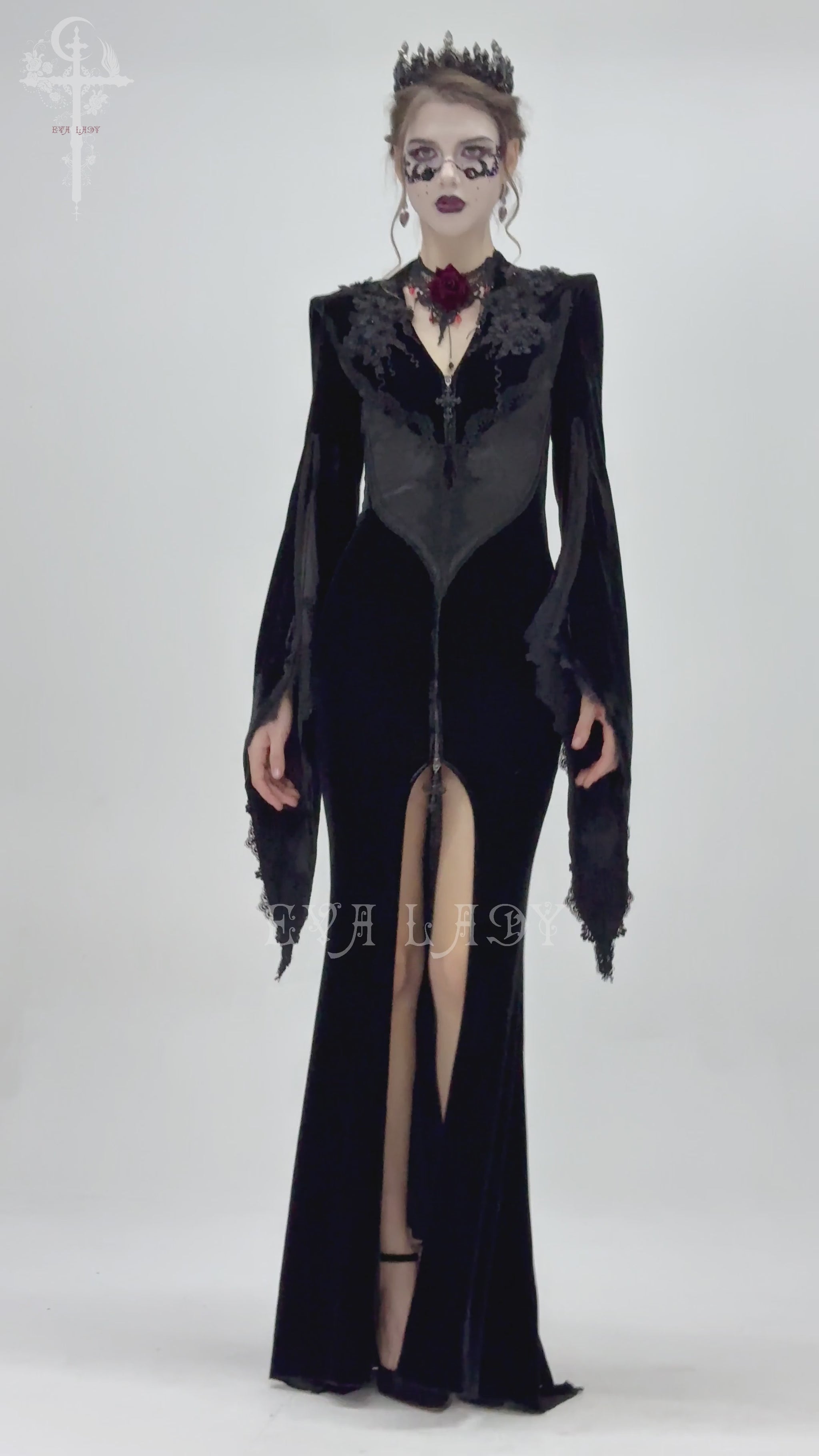 Elegant Gothic black velvet long dress with lace details, flared sleeves, and front zipper for dramatic evening wear.