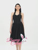 Elegant black corset midi dress with soft net skirt, perfect for evening events and showcasing graceful movement.