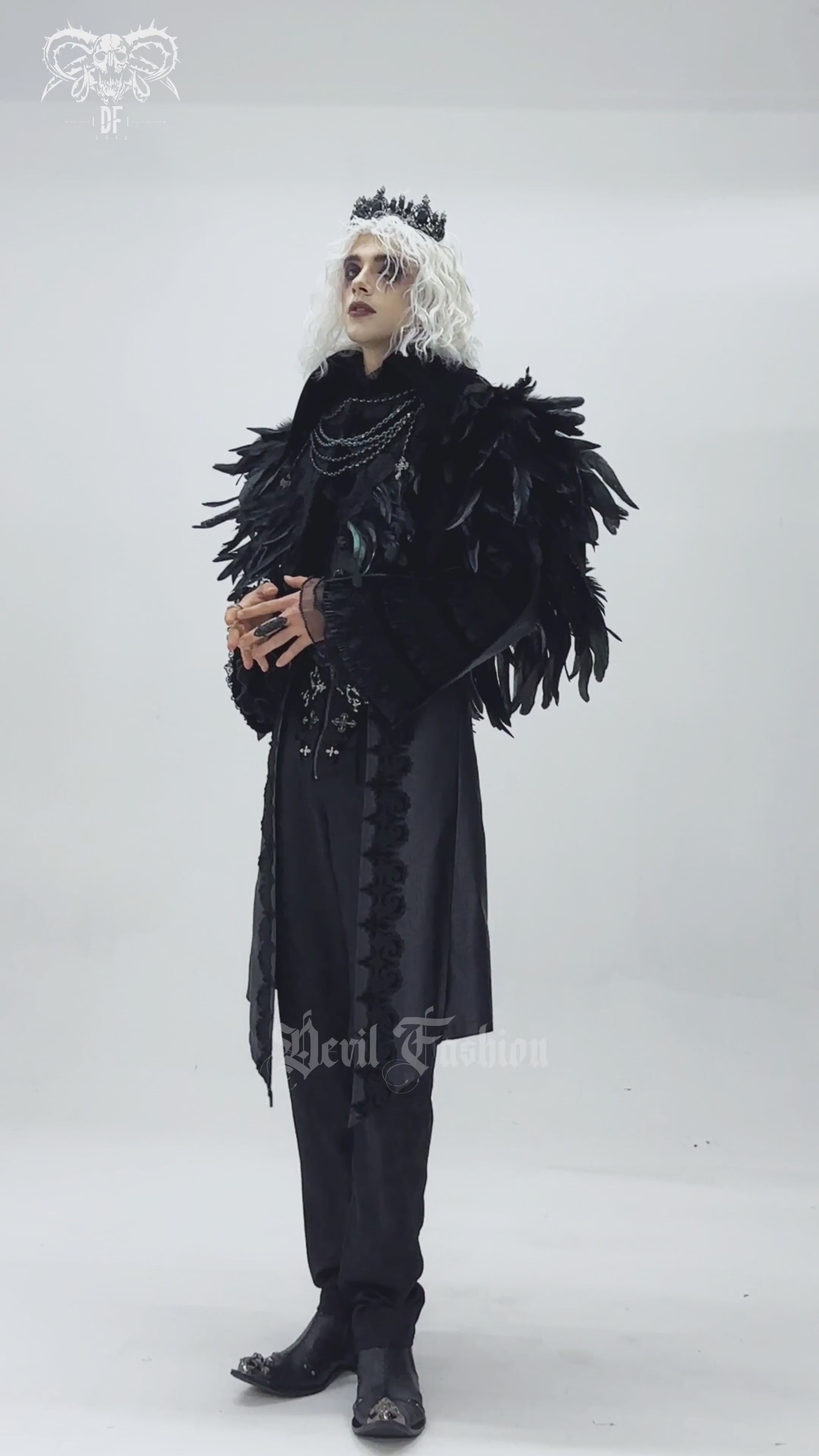 Gothic Feather Shoulder Cape with Lace and Chains worn by a model, showcasing intricate design and dark aesthetic.
