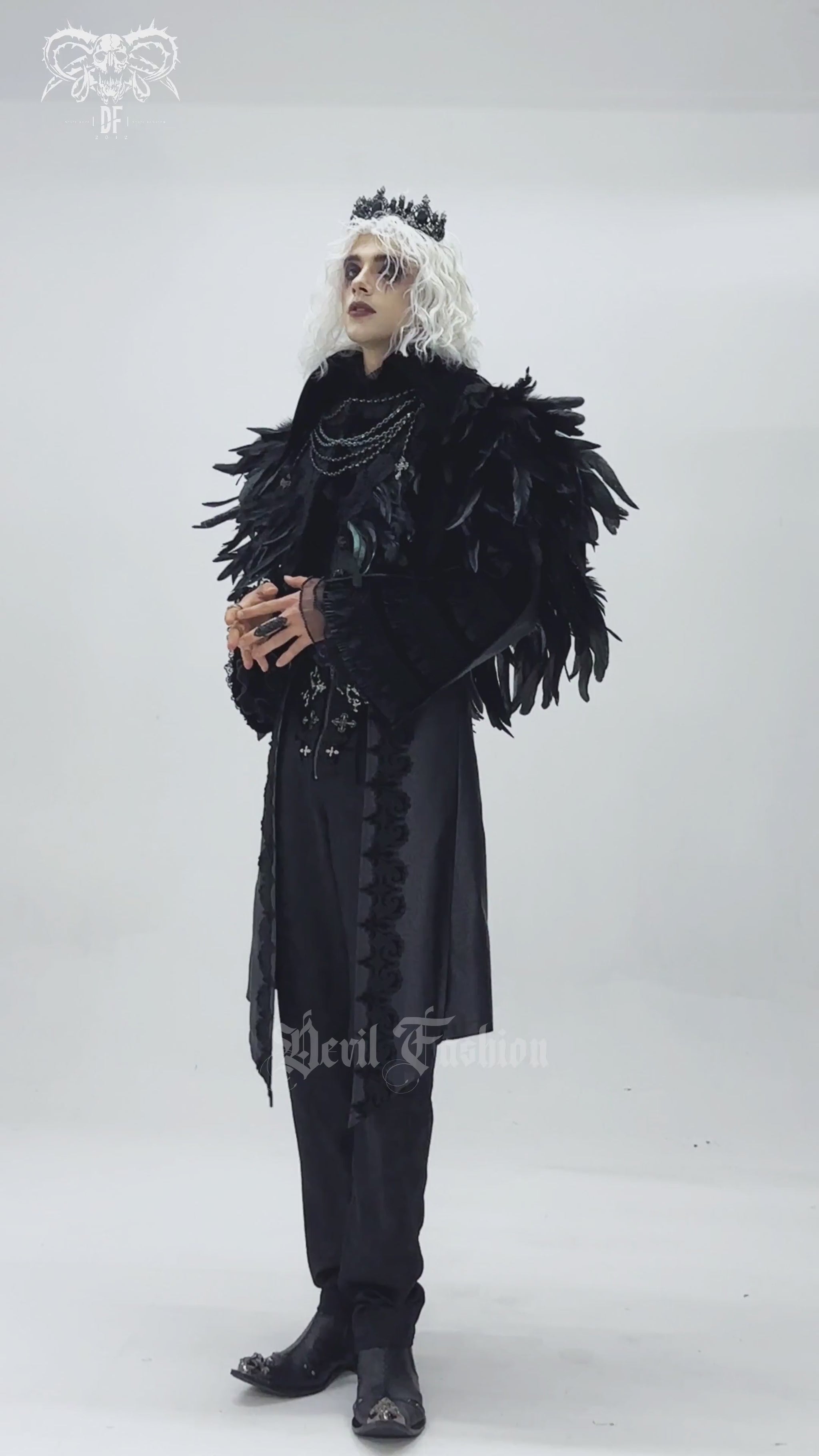 Gothic Feather Shoulder Cape with Lace and Chains worn by a model, showcasing intricate design and dark aesthetic.