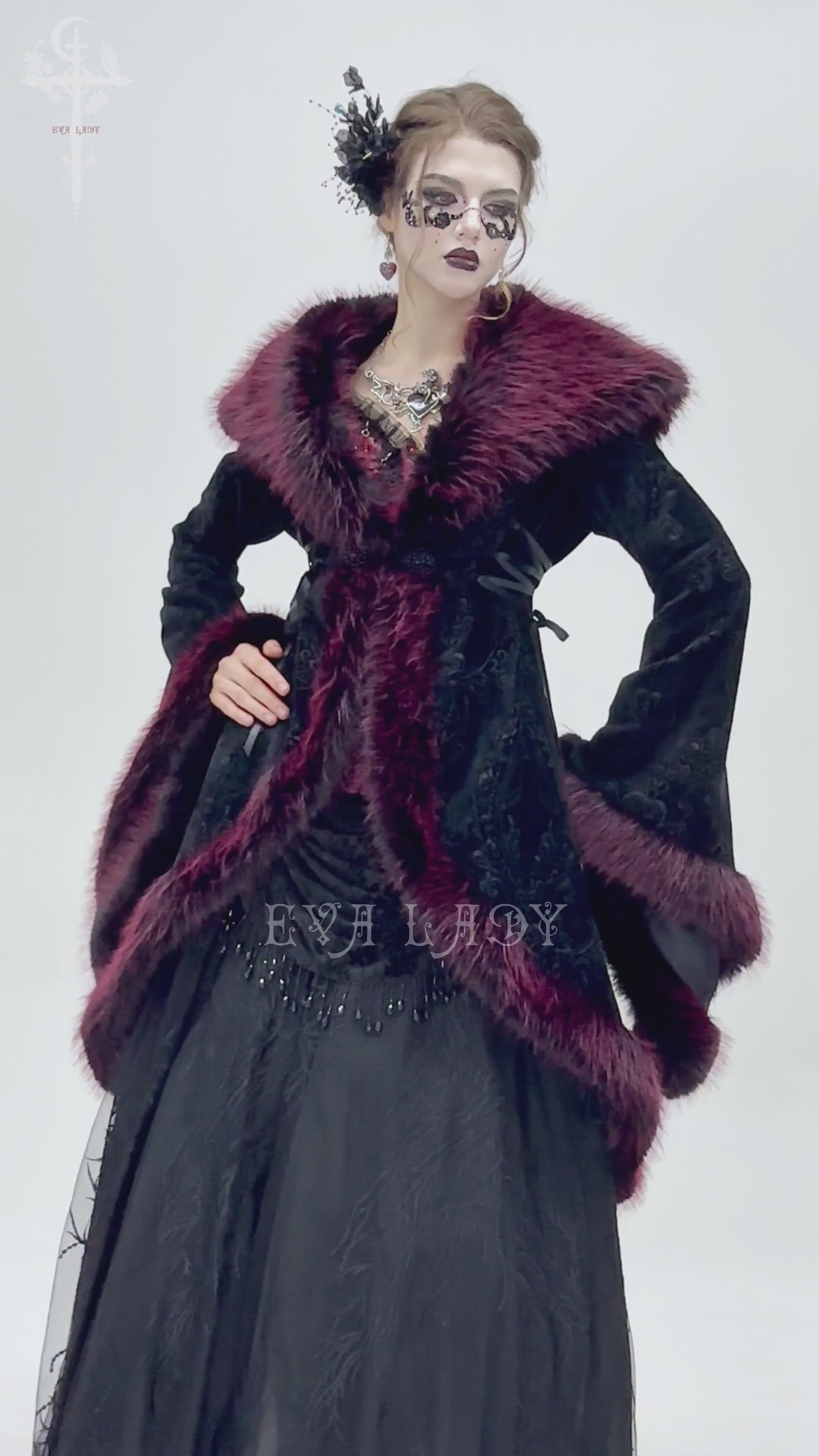 Vintage black coat with burgundy faux fur trim, intricate lace details, and gothic elegance, perfect for special occasions.