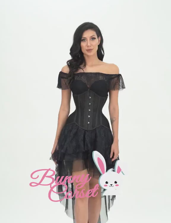 Elegant model wearing a black mesh underbust corset with lace sleeves and a layered skirt.