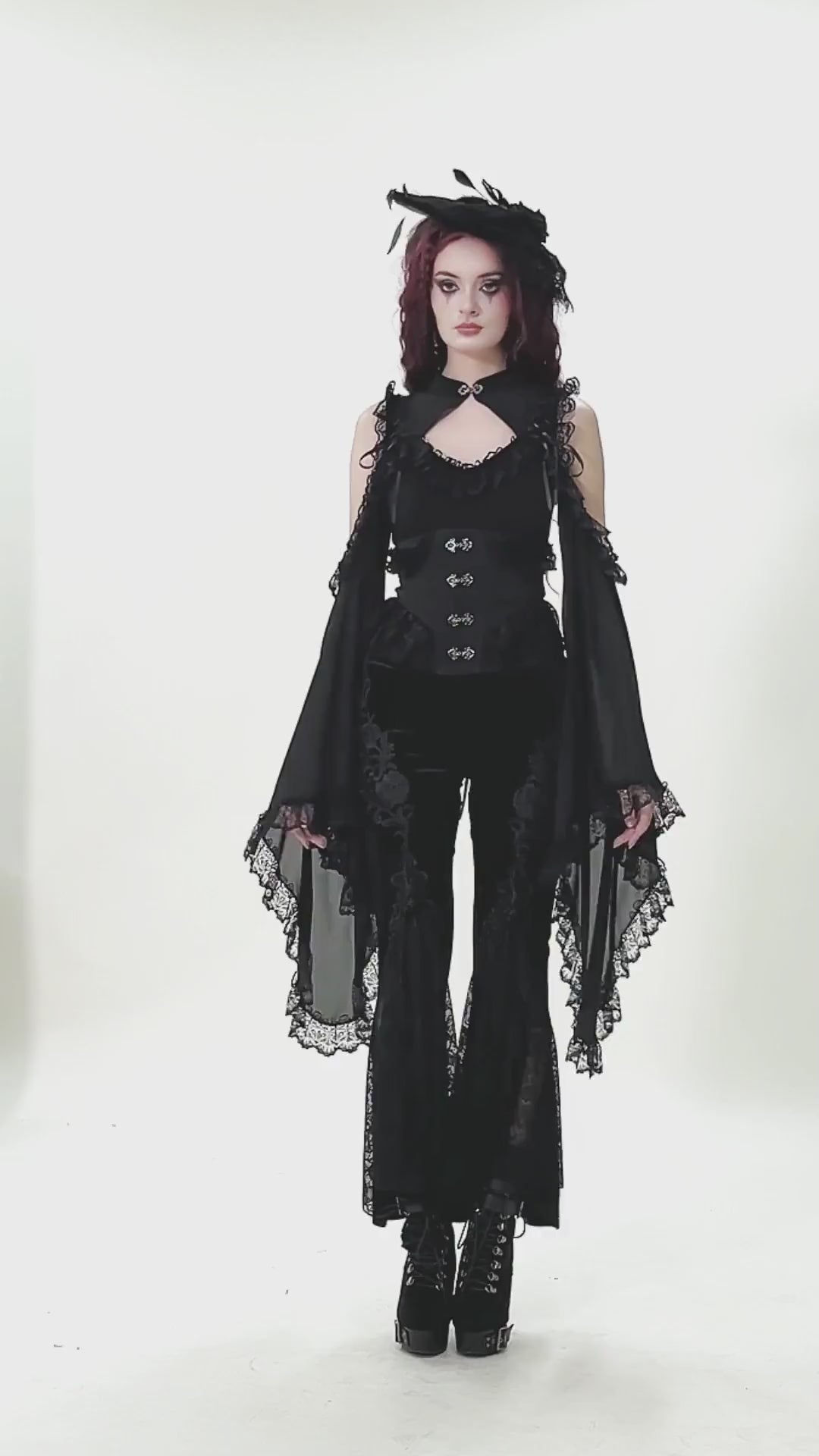 Elegant Lace Flare Pants with Layered Ruffled Hem Design modeled with a gothic outfit for dark elegance.
