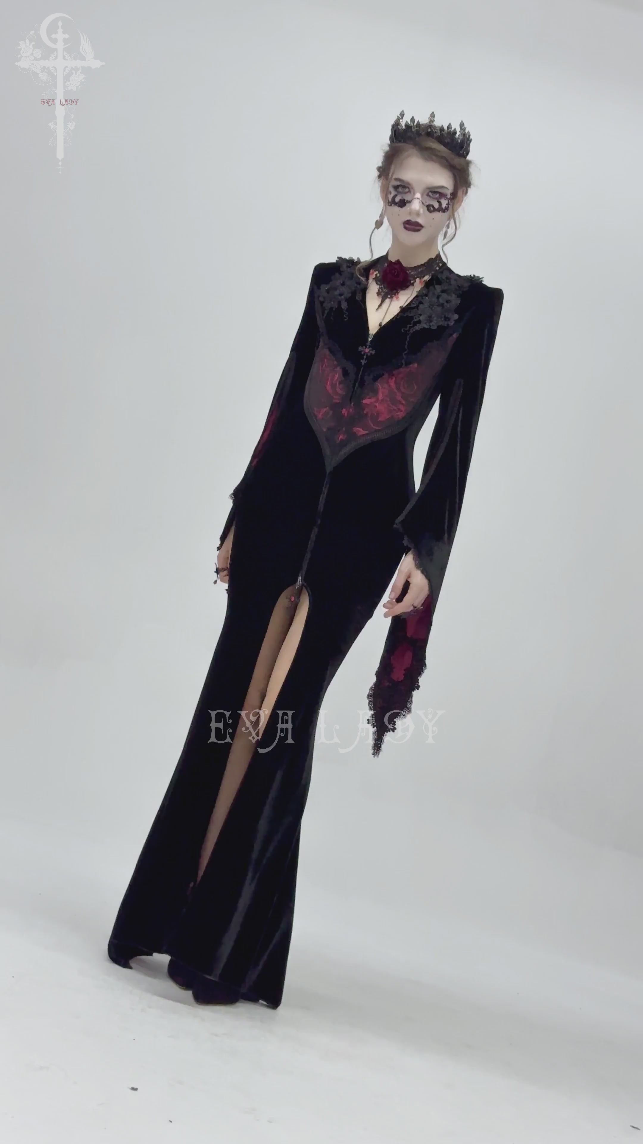 Chic velvet evening dress with lace and wine red details, featuring dramatic sleeves and a deep slit for gothic elegance.
