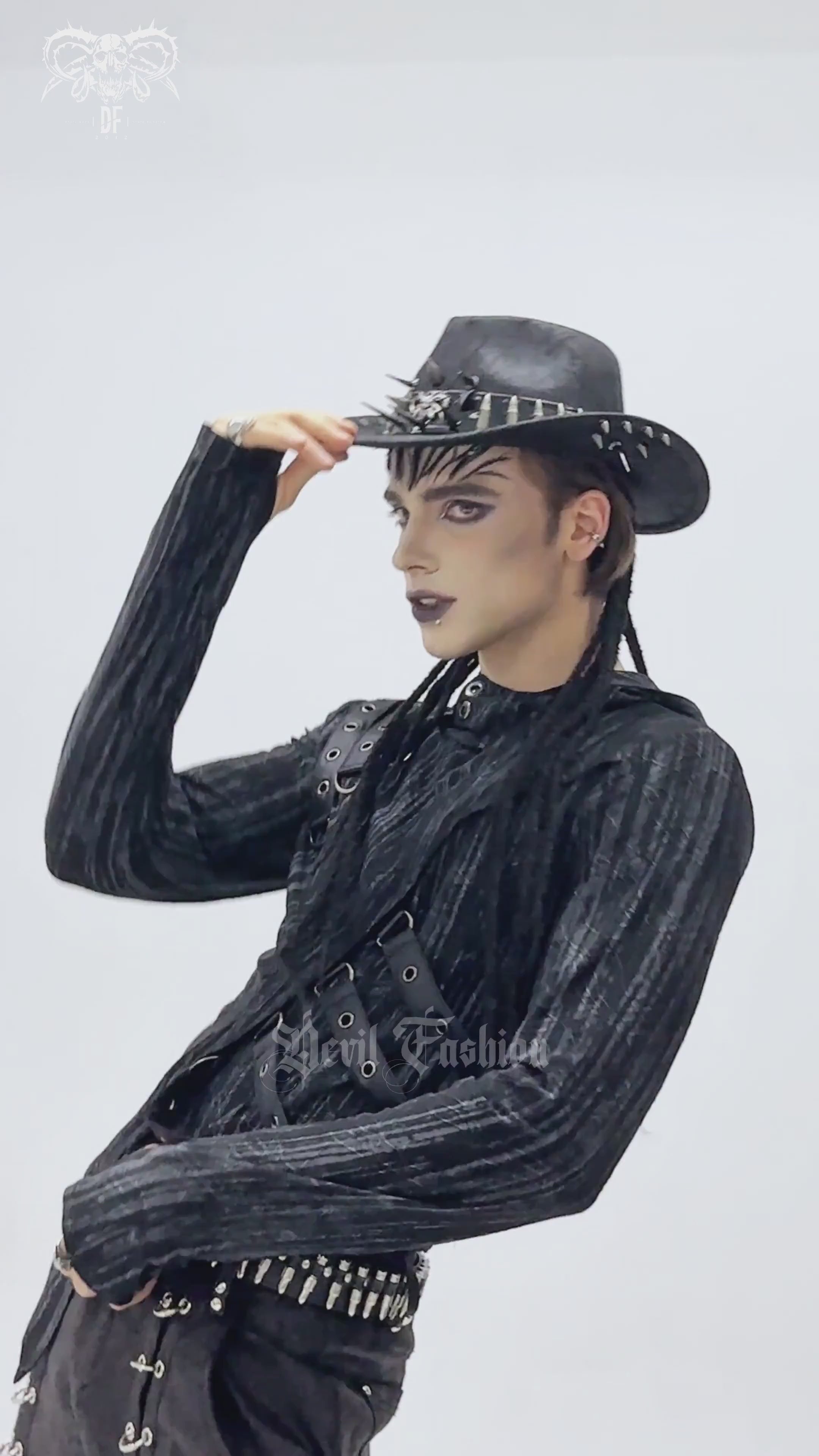 Gothic Cowboy Hat with Metal Bullets and Skull Design worn by a model showcasing dark fashion style.