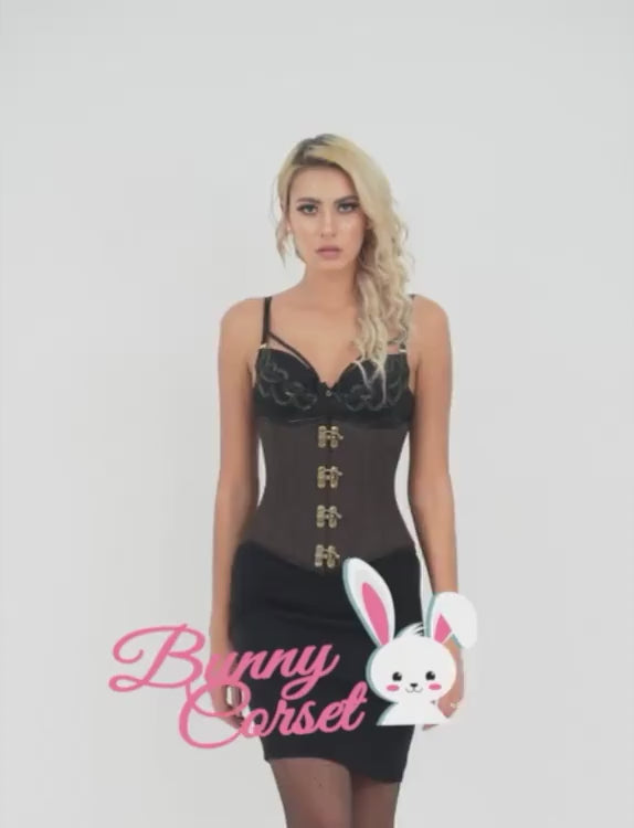 Woman modeling a black Bunny Corset with intricate design, front metal clasp, and stylish look on a white background.