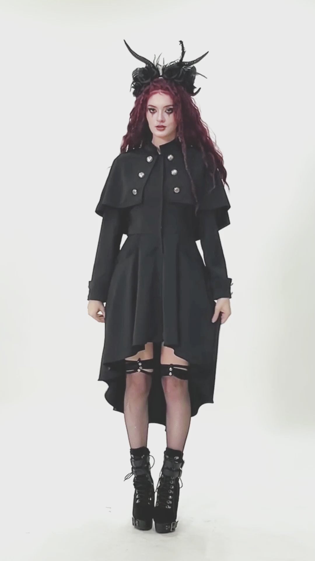 Gothic High Low Coat Dress with Cape and Silver Buttons on a model showcasing its elegant high-low design.