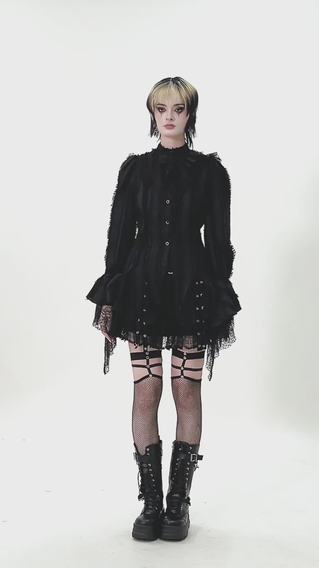 Gothic Lace Ruffle Long Sleeve Shirt with Button Closure worn by model in dramatic black ensemble.
